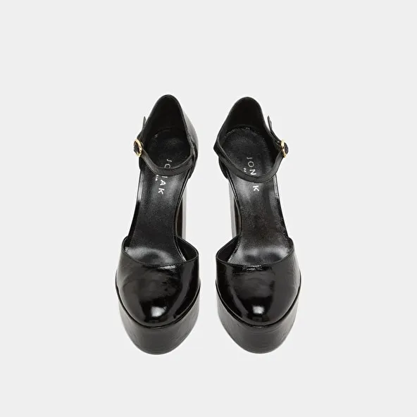 Heeled Mary Jane and platforms in black glazed leather