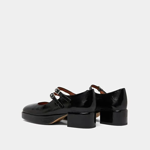 Heeled mary janes with straps in black leather