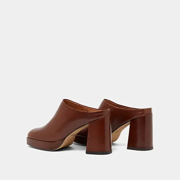 Heeled mules in brown leather