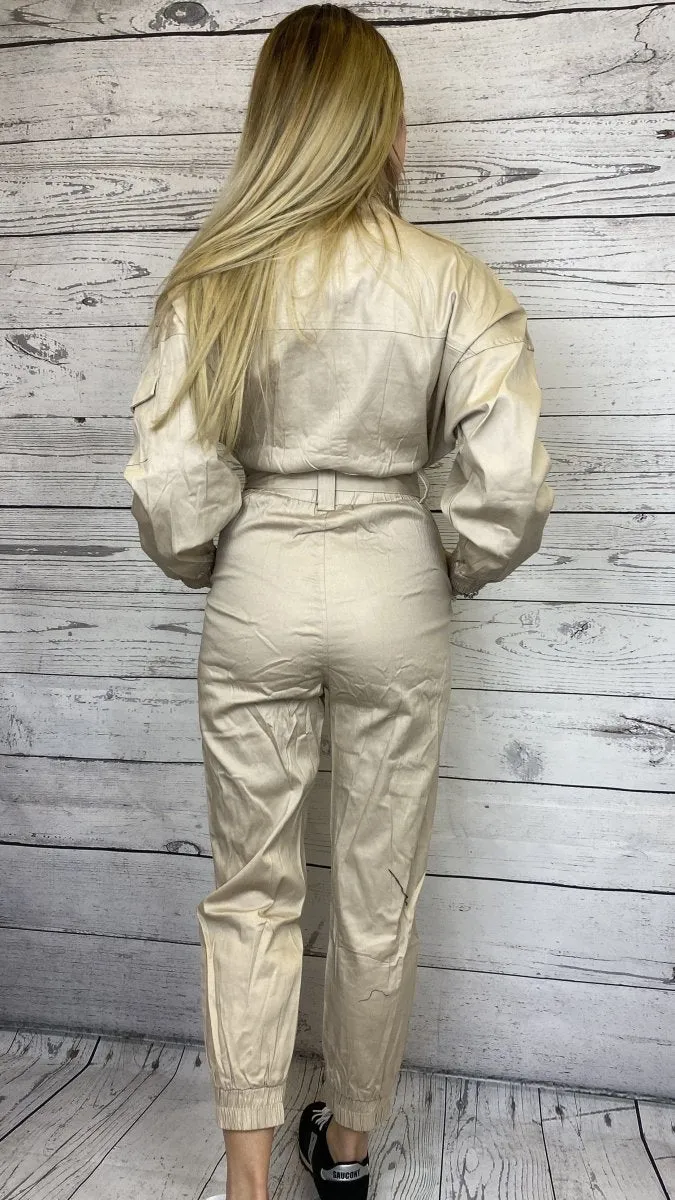 Jumpsuit beige con coulisse e bottoni argento